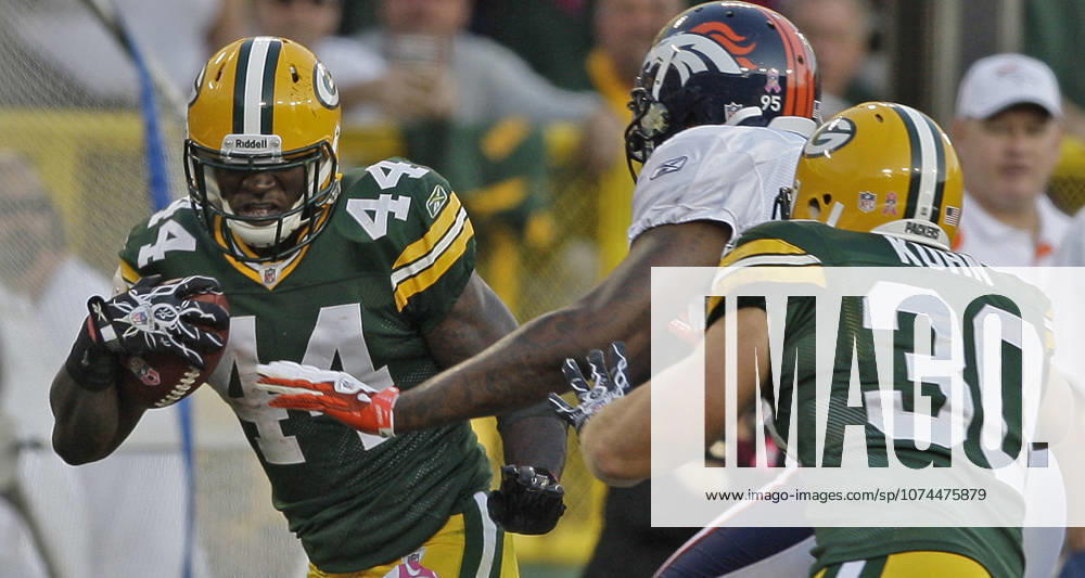 Oct. 2, 2011 - Green Bay, WI, USA - Green Bay Packers running back James Starks broke free for a 22-yard gain against the Denver Broncos in the fourth quarter at Lambeau Field in Green Bay, Wisconsin, Sunday, October 2, 2011. The Packers defeated the Broncos, 49-23.