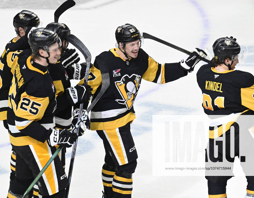 Pittsburgh Penguins right wing Rickard Rakell (67) celebrates his the overtime penalty shot goal in the Pittsburgh Penguins 5-4 win against the Winnipeg Jets at PPG Paints Arena in Pittsburgh on Saturday, March 21, 2026. PIT2026032114 ARCHIExCARPENTER