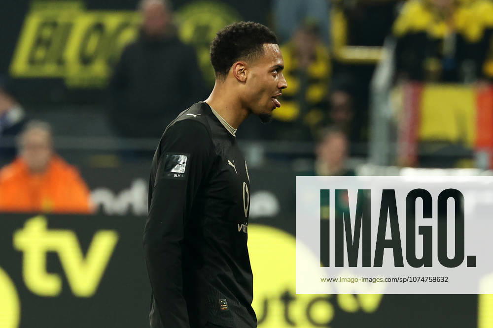 Dortmund, Germany, 21 03 26, Felix Nmecha Borussia Dortmund watches during the Bundesliga 1 match between Borussia Dortmund Hamburger SV at Signal Iduna Park in Dortmund Photo by Joachim Bywaletz DFB DFL REGULATIONS PROHIBIT ANY USE OF PHOTOGRAPHS AS IMAGE SEQUENCES AND OR QUASI VIDEO