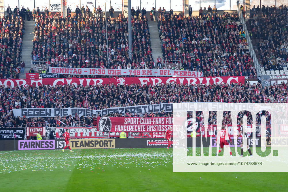 Banner of the fans and Ultras in the stands, Banner, Against the DFL, Kick-off times , Germany, Football, 1 Bundesliga, 27 Matchday, 2025 2026, FC St Pauli vs SC Freiburg, 22 03 2026, Millerntor Stadion, Hamburg, Germany DFL REGULATIONS PROHIBIT ANY USE OF PHOTOGRAPHS AS IMAGE SEQUENCES AND OR QUASI VIDEO Hamburg Millerntor Stadion Hamburg Germany