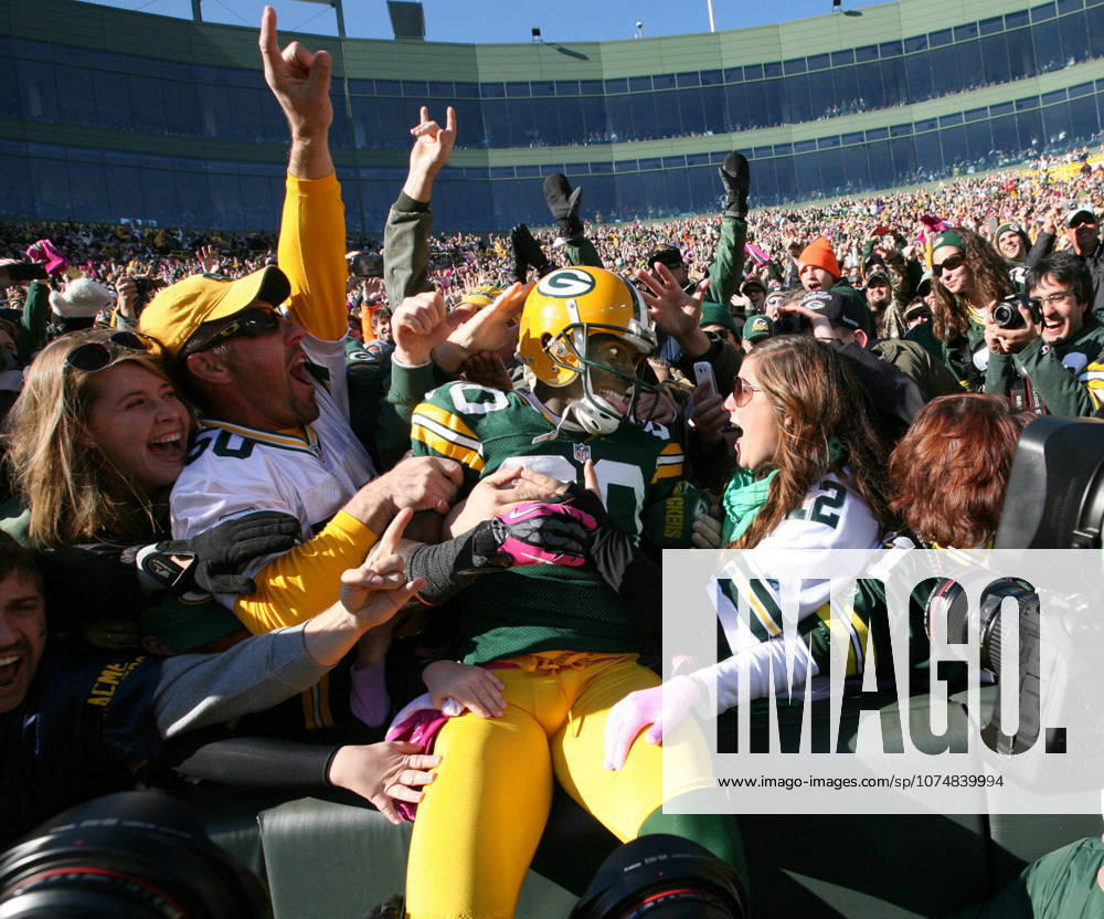 Oct. 28, 2012 - Green Bay, WI, USA - Green Bay Packers wide receiver Donald Driver celebrates his touchdown catch against the Jacksonville Jaguars with fans in the fourth quarter at Lambeau Field in Green Bay, Wisconsin, Sunday, October 28, 2012. The Packers beat the Jaguars, 25-15.