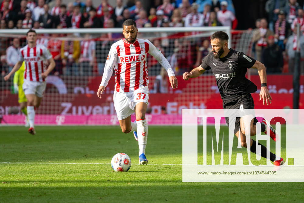 Duel between Linton Maina 1 FC Koeln, 37 and Franck Honorat Borussia Moenchengladbach, 09 1 FC Koeln vs Borussia Moenchengladbach, Football, 1 Bundesliga, 27 Matchday, Season 2025 2026, 21 03 2026 DFL DFB Regulations prohibit any use of Photographs as image sequences and or Quasivideo 1 FC Koeln vs Borussia Moenchengladbach, Football, 1 Bundesliga, 27 Matchday, Season 2025 2026, 21 03 2026 Koeln
