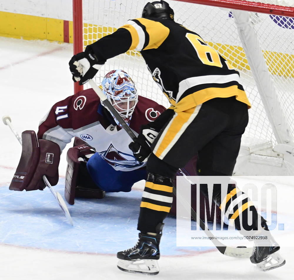 Pittsburgh Penguins right wing Rickard Rakell (67) scores on Colorado Avalanche goaltender Scott Wedgewood (41) in the third period of the Pittsburgh Penguins 6-2 lost at PPG Paints Arena in Pittsburgh on Tuesday, March 24, 2026. PIT2026032420 ARCHIExCARPENTER