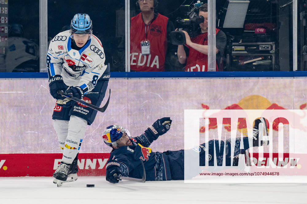 Fight for the puck duel between Philipp Krauss ERC Ingolstadt, 8 and Fabio Wagner EHC Red Bull Muenchen, 55 GER, EHC Red Bull Muenchen vs ERC Ingolstadt, Ice Hockey, DEL, Playoffs, Quarterfinals Game 1, Season 2025 2026, 24 03 2026 GER, EHC Red Bull Muenchen vs ERC Ingolstadt, Ice Hockey, DEL, Playoffs, Quarterfinals Game 1, Season 2025 2026, 24 03 2026 Muenchen