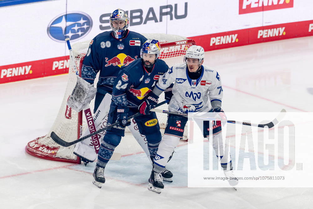Ryan Murphy EHC Red Bull Muenchen, 24 defends against Justin Schuetz Adler Mannheim, 74 in front of Antoine Bibeaus goal Goalkeeper, EHC Red Bull Muenchen, 30 GER, EHC Red Bull Muenchen vs Adler Mannheim, Ice Hockey, DEL, Playoffs, Semifinal Game 2, 2025 2026 Season, 10 04 2026 GER, EHC Red Bull Muenchen vs Adler Mannheim, Ice Hockey, DEL, Playoffs, Semifinal Game 2, 2025 2026 Season, 10 04 2026 Muenchen