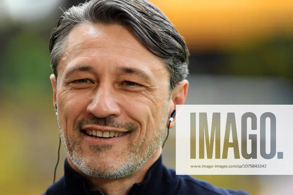 Coach Niko Kovac Borussia Dortmund smiles during the Bundesliga match between Borussia Dortmund and Bayer 04 Leverkusen, Signal Iduna Park on April 11, 2026 in Dortmund, Germany Photo by Ralf Treese DeFodi Images Trainer Niko Kovac Borussia Dortmund smiles during the Bundesliga match between Borussia Dortmund and Bayer 04 Leverkusen at Signal Iduna Park on April 11, 2026 in Dortmund, Germany Photo by Ralf Treese DeFodi Images DFL regulations prohibit any use of photographs as image sequences and or quasi video Photo by Ralf Treese DeFodi Images