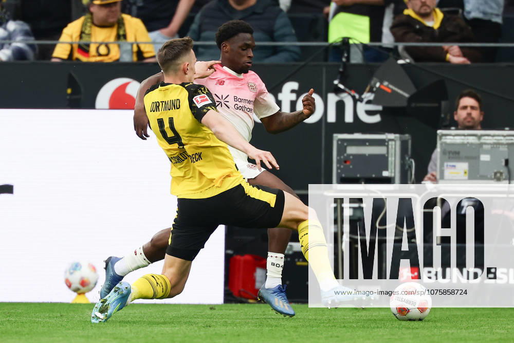 Dortmund, Germany, 11 04 26, Nico Schlotterbeck Borussia Dortmund and Ernest Poku Bayer 04 Leverkusen during the Bundesliga 1 match between Borussia Dortmund Bayer 04 Leverkusen at Signal Iduna Park in Dortmund Photo by Joachim Bywaletz DFB DFL REGULATIONS PROHIBIT ANY USE OF PHOTOGRAPHS AS IMAGE SEQUENCES AND OR QUASI VIDEO
