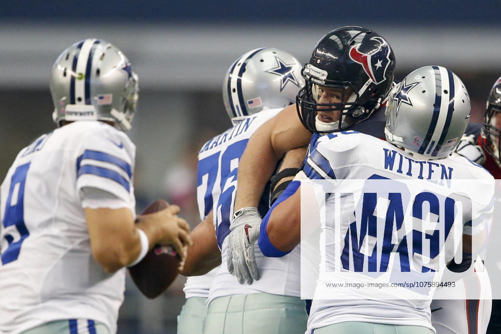 Houston Texans defensive end J.J. Watt (99) is blocked by Dallas Cowboys tight end Jason Witten (82) while rushing the the quarterback during the NFL, American Football Herren, USA game between the Houston Texans and the Dallas Cowboys at AT&T Stadium in Arlington, TX. The Cowboys defeated the Texans 20-17 in overtime.