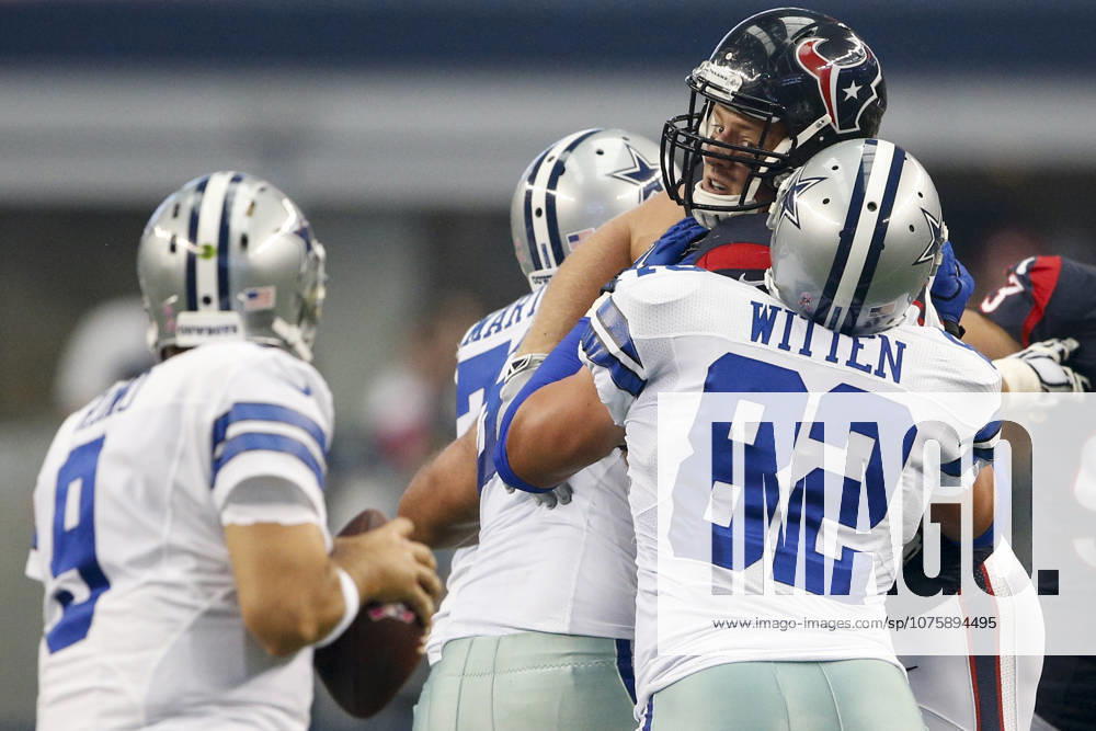 Houston Texans defensive end J.J. Watt (99) is blocked by Dallas Cowboys tight end Jason Witten (82) while rushing the the quarterback during the NFL, American Football Herren, USA game between the Houston Texans and the Dallas Cowboys at AT&T Stadium in Arlington, TX. The Cowboys defeated the Texans 20-17 in overtime.