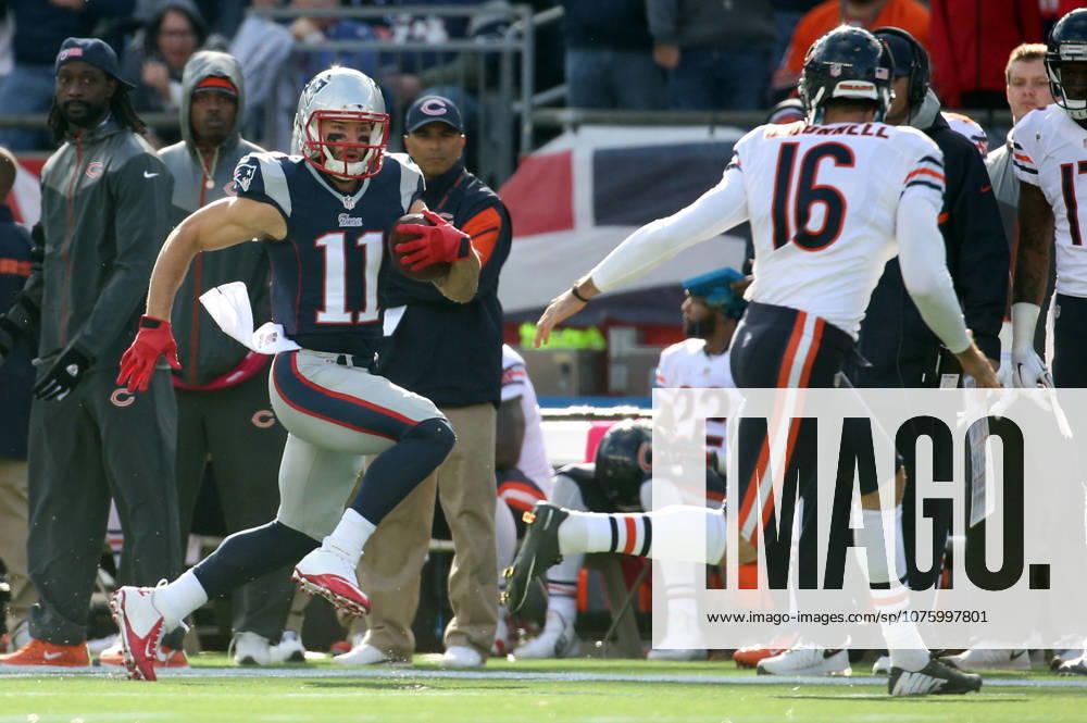 Oct. 26, 2014 - Foxborough, MA, USA - New England Patriots wide receiver Julian Edelman (11) returns a punt against Chicago Bears punter Pat O Donnell (16) in the second quarter Sunday, Oct. 26, 2014 at Gillette Stadium in Foxborough, Mass. The Patriots defeated the Bears 51-23.