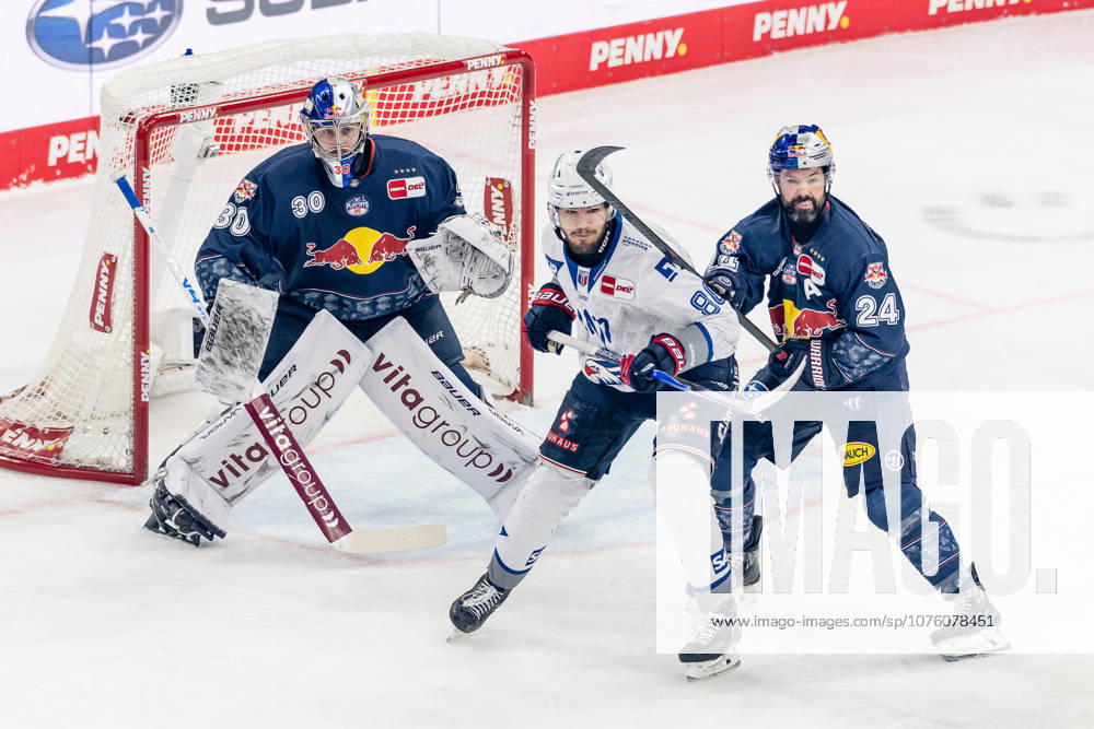 Ryan Murphy EHC Red Bull Muenchen, 24 defends against Maximilian Heim Adler Mannheim, 86 in front of Antoine Bibeaus goal Goalkeeper, EHC Red Bull Muenchen, 30 GER, EHC Red Bull Muenchen vs Adler Mannheim, Ice Hockey, DEL, Playoffs, Semifinal Game 4, 2025 2026 Season, 14 04 2026 GER, EHC Red Bull Muenchen vs Adler Mannheim, Ice Hockey, DEL, Playoffs, Semifinal Game 4, 2025 2026 Season, 14 04 2026 Muenchen