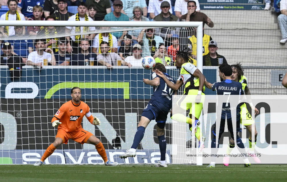 Penalty area scene, goal area scene Goal shot Action Goal chance Carney Chukwuemeka Borussia Dortmund BVB 17 vs Wouter Burger TSG 1899 Hoffenheim 18 Goalkeeper Oliver Baumann TSG 1899 Hoffenheim 01 TSG 1899 Hoffenheim vs Borussia Dortmund BVB 18 04 2026 DFL REGULATIONS PROHIBIT ANY USE OF PHOTOGRAPHS AS IMAGE SEQUENCES AND OR QUASI VIDEO TSG 1899 Hoffenheim vs Borussia Dortmund