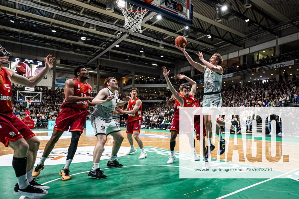Marco Hollersbacher Gladiators Trier in a duel with Neno Dimitrijevic FC Bayern Muenchen Basketball , Vet Concept Gladiators Trier vs FC Bayern Muenchen Basketball , Basketball, easyCredit BBL, Matchday 30, Season 2025 2026, 20 04 2026 Vet Concept Gladiators Trier vs FC Bayern Muenchen Basketball , Basketball, easyCredit BBL, Matchday 30, Season 2025 2026