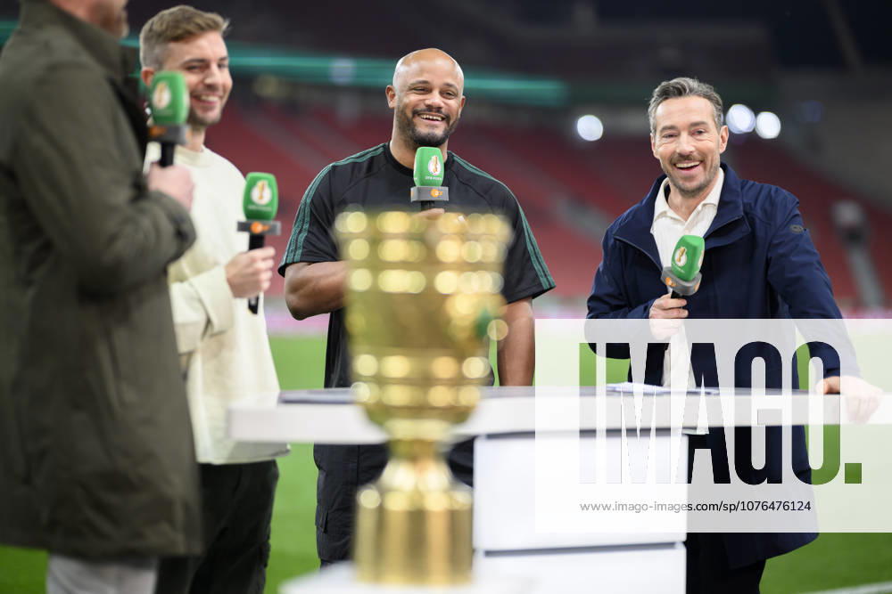 Coach Vincent Kompany Bayern Munich is behind the DFB Cup, laughs, good mood after the game at the ZDF interview, l r Christoph Kramer former football player, ZDF football expert , Kompany, Sven Voss ZDF presenter football DFB Cup semi-final Bayer 04 Leverkusen Bayern Munich, on 22 04 2026 in Leverkusen Germany BayArena