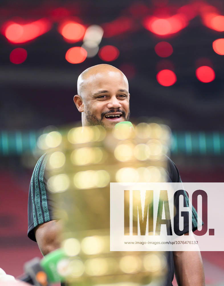 Coach Vincent Kompany Bayern Munich stands behind the DFB Pokal, laughs, good mood after the match Soccer DFB Pokal Semifinal Bayer 04 Leverkusen Bayern Munich, on 22 04 2026 in Leverkusen Germany BayArena