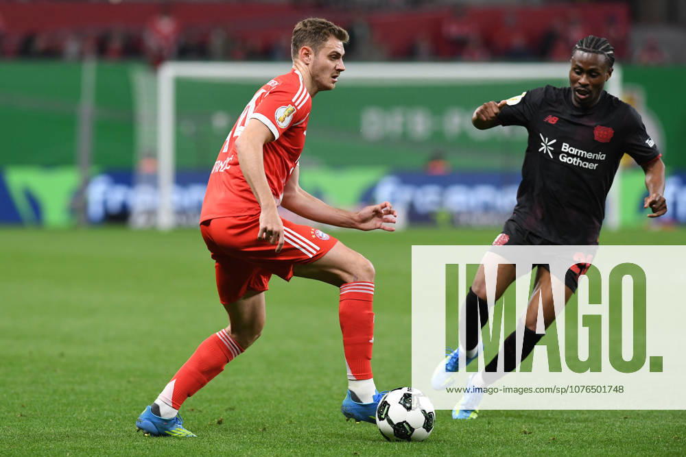 Josip Stanisic FC Bayern Muenchen and Nathan Tella Bayer 04 Leverkusen in a duel during the DFB Cup semifinal match between Bayer 04 Leverkusen v FC Bayern Munich, BayArena on April 22, 2026 in Leverkusen, Germany Photo by Ralf Treese DeFodi Images Josip Stanisic FC Bayern Muenchen and Nathan Tella Bayer 04 Leverkusen battle for the ball during the DFB Cup semifinal match between Bayer 04 Leverkusen and FC Bayern München at BayArena on April 22, 2026 in Leverkusen, Germany Photo by Ralf Treese DeFodi Images