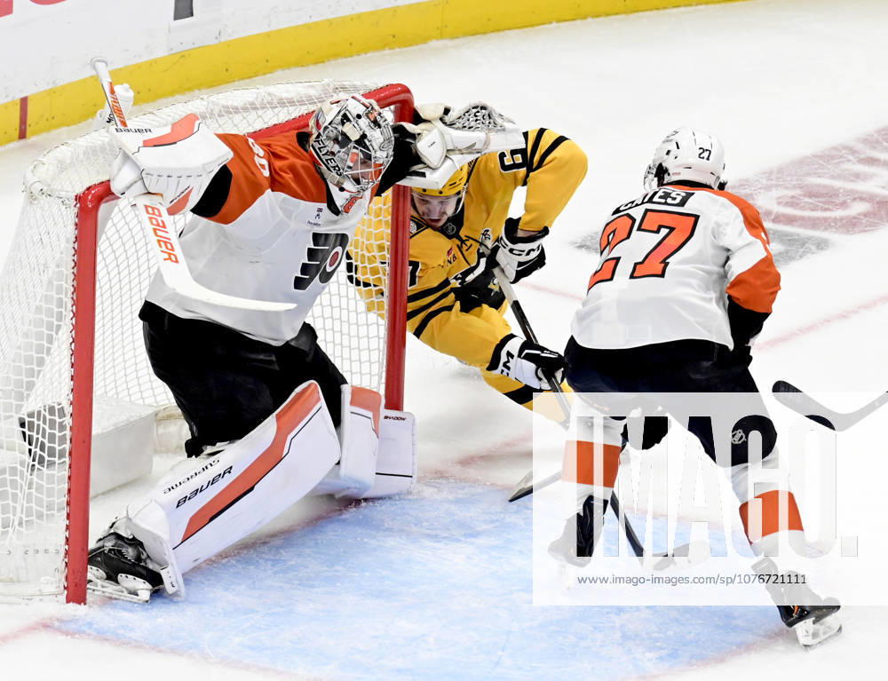 Pittsburgh Penguins right wing Rickard Rakell (67) watches as Pittsburgh Penguins defenseman Kris Letang shot finds the goal behind the skate of Philadelphia Flyers goaltender Dan Vladar (80) during the second period of the Penguins 3-2 win in the opening round of the Eastern Conference playoffs at PPG Paints Arena in Pittsburgh on Monday, April 27, 2026. PIT2026042714 ARCHIExCARPENTER