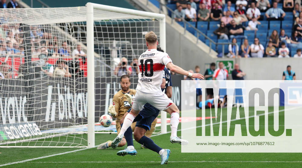 Sinsheim , Soccer Bundesliga TSG 1899 Hoffenheim vs VfB Stuttgart , Scorer Chris Führich VfB, center shoots the goal to 1 1, f l Oliver Baumann Hoffenheim , Chris Führich VfB , Ozan Kabak Hoffenheim