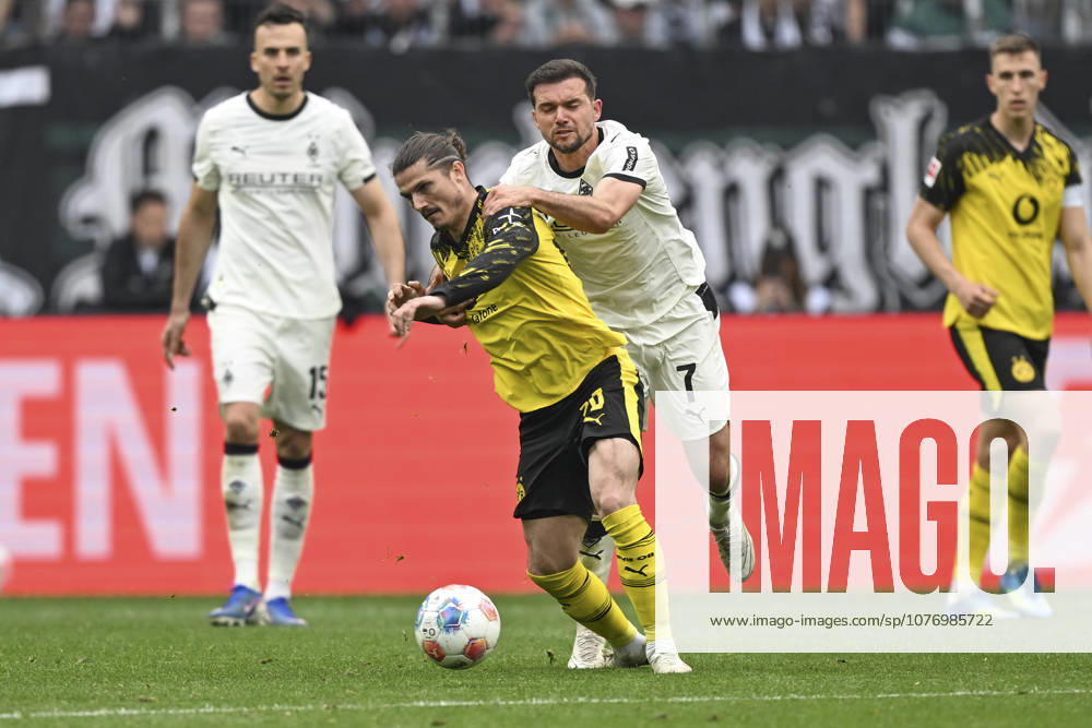 V li in duel Marcel Sabitzer Dortmund 20 Kevin Stöger Stoeger Moenchengladbach 7 03 05 2026 ¢ Football ¢ Borussia Moenchengladbach vs Borussia Dortmund, Borussia Park, Moenchengladbach, DFB DFL REGULATIONS PROHIBIT ANY USE OF PHOTOGRAPHS AS IMAGE SEQUENCES AND OR QUASI VIDEO