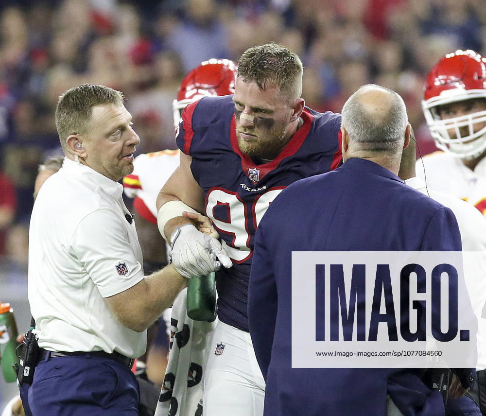 Houston Texans defensive end J.J. Watt (99) is helped off the field after sustaining a knee injury in the first quarter during the NFL, American Football Herren, USA game between the Kansas City Chiefs and the Houston Texans at NRG Stadium in Houston, TX. John Glaser CSM.