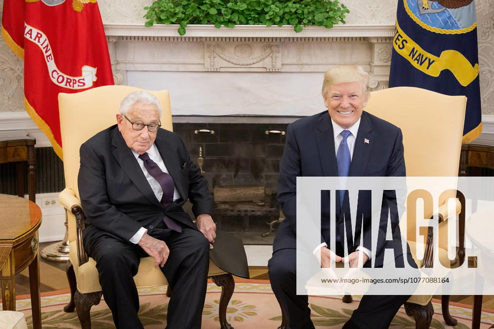 Washington, DC, United States of America - U.S. President Donald Trump meets with former Secretary of State Dr. Henry Kissinger in the Oval Office of the White House October 10, 2017 in Washington, D.C.