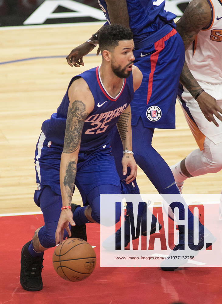 Los Angeles, California, U.S - Austin Rivers 25 of the Los Angeles Clippers with the ball during their first regular season game against the Phoenix Suns on Saturday October 21, 2017 at the Staples Center in Los Angeles, California. Clippers defeat Suns, 130-88.