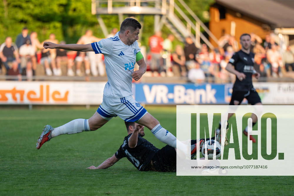 Soccer Mens Regionalliga Bayern Season 2025 2026 33 Matchday 08 05 2026 TSV Buchbach Viktoria Aschaffenburg SMR Arena Benjamin Baier L of SV Viktoria Aschaffenburg in a duel with Sammy Ammari R of TSV Buchbach Buchbach SMR Arena Bavaria Germany