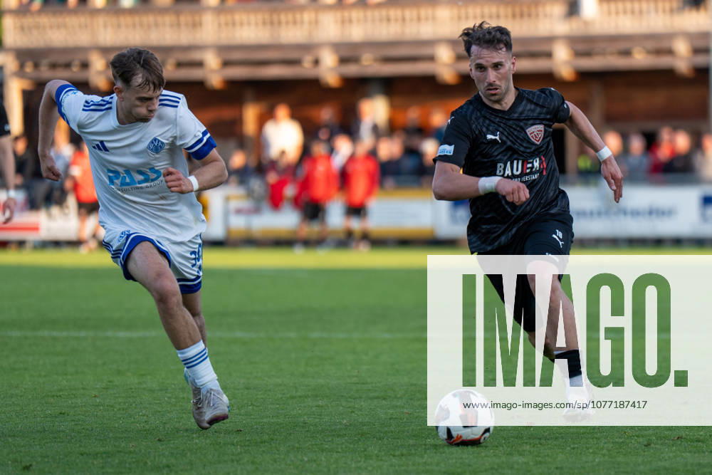 Soccer Men Regionalliga Bayern Season 2025 2026 33 Matchday 08 05 2026 TSV Buchbach Viktoria Aschaffenburg SMR Arena Matvey Obolkin L of SV Viktoria Aschaffenburg in a duel with Samed Bahar R of TSV Buchbach Buchbach SMR Arena Bavaria Germany