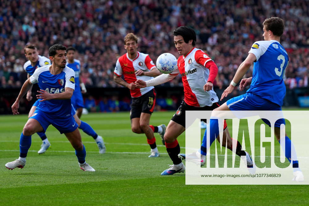Eredivisie: Feyenoord Rotterdam v AZ Alkmaar Rotterdam - Alexandre Penetra of AZ Alkmaar, Ayase Ueda of Feyenoord Rotterdam, Wouter Goes of AZ Alkmaar during the 33rd competition round of the 2025 2026 Eredivisie season. The match is set between Feyenoord Rotterdam and AZ Alkmaar at De Kuip on 10 May 2026 in Rotterdam, The Netherlands.