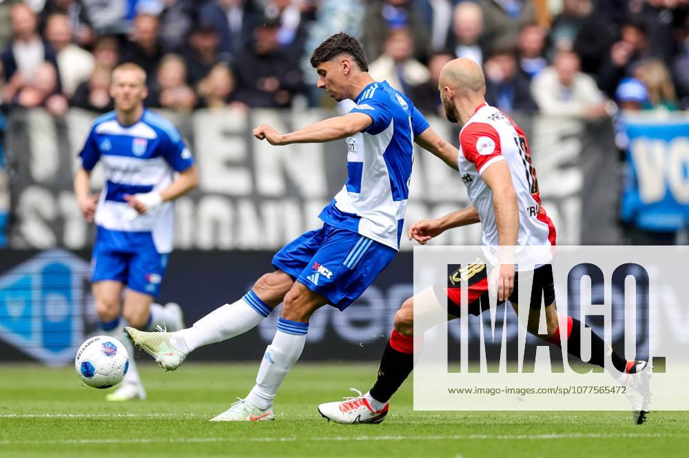 , MACÂ³PARK , season 2025 2026 , Dutch Eredivisie Football , match between PEC Zwolle and Feyenoord , picture shows PEC Zwolle player Koen Kostons is challenged by Feyenoord player Gernot Trauner PEC - Feyenoord x203757572x