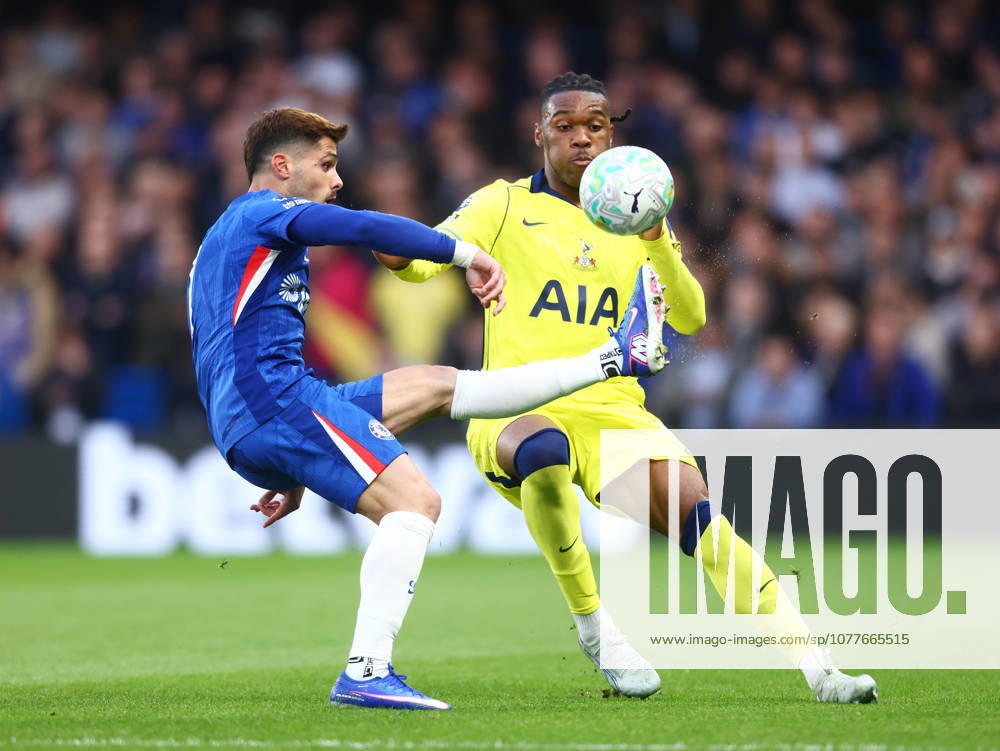 Chelsea v Tottenham Hotspurs, English Premier League, Stamford Bridge, London, UK - 19 05 2026 Pedro Neto of Chelsea flicks the ball over Destiny Udogie of Tottenham Hotspurs during the Premier League game at Stamford Bridge London Stamford Bridge London GBR, UK NEWSPAPERS OUT