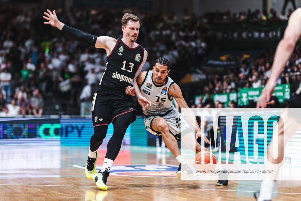 Jordan Roland Gladiators Trier in duel with Andreas Obst FC Bayern Muenchen Basketball , Vet Concept Gladiators Trier vs FC Bayern Muenchen Basketball, Basketball, easyCredit BBL, Playoffs, Quarterfinals, Game 3, Season 2025 2026, 23 05 2026 Vet Concept Gladiators Trier vs FC Bayern Muenchen Basketball, Basketball, easyCredit BBL, Playoffs, Quarterfinals, Game 3, Season 2025 2026