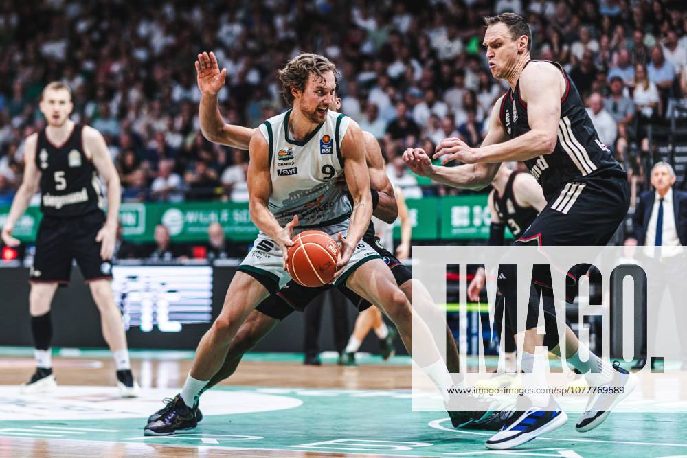 Marco Hollersbacher Gladiators Trier in a duel with Osacar das Silva FC Bayern Muenchen Basketball and Johannes Voigtmann FC Bayern Muenchen Basketball , Vet Concept Gladiators Trier vs FC Bayern Muenchen Basketball, Basketball, easyCredit BBL, Playoffs, Quarterfinals, Game 3, Season 2025 2026, 23 05 2026 Vet Concept Gladiators Trier vs FC Bayern Muenchen Basketball, Basketball, easyCredit BBL, Playoffs, Quarterfinals, Game 3, Season 2025 2026