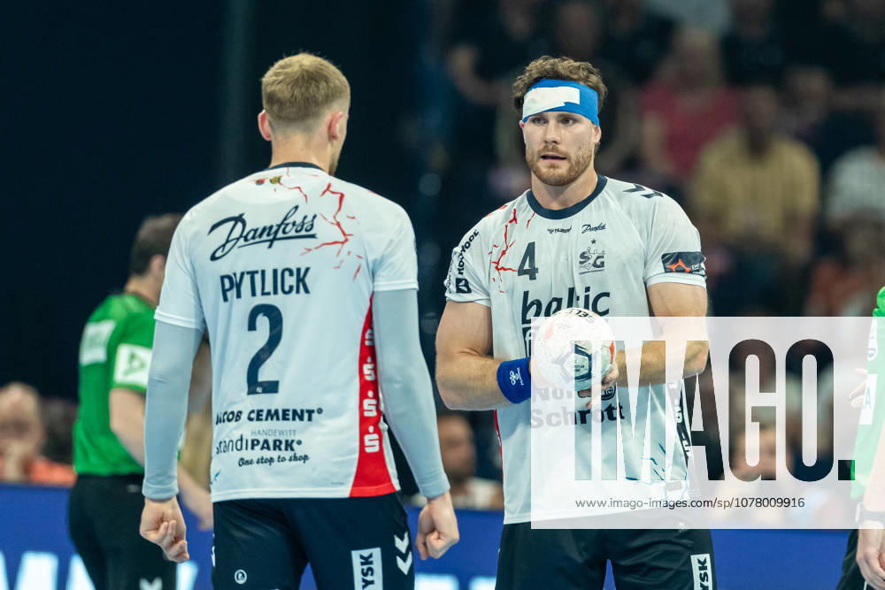 Simon Pytlick SG Flensburg Handewitt and Johannes Golla SG Flensburg Handewitt speaks with during the handball semi final of the Winamax EHF Finals 2026 between MT Melsungen and SG Flensburg Handewitt at Barclays Arena on May 30, 2026 in Hamburg, Germany