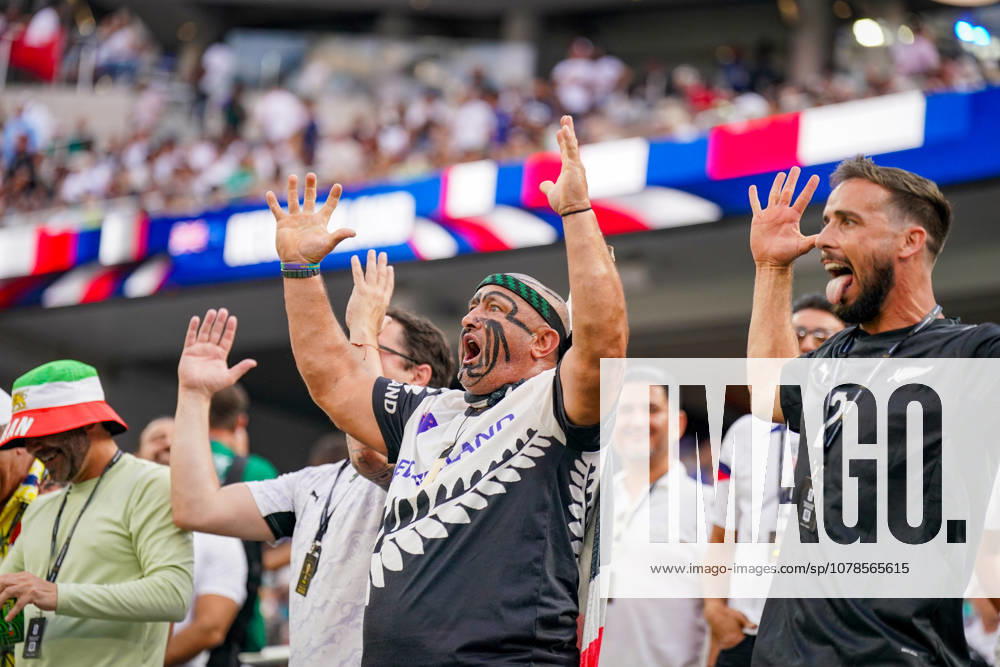 USA Soccer FIFA World Cup 2026 Group Stage Group G Iran vs. New Zealand SoFi Stadium, Inglewood, Los Angeles County, California New Zealand fans watch the World Cup match from the stands, creating a lively atmosphere with face paint, traditional Maori-inspired body art, and humorous gestures The image symbolizes fan culture, passion, and support for the All Whites at the 2026 FIFA World Cup Facial expressions, emotions,detected_source_language