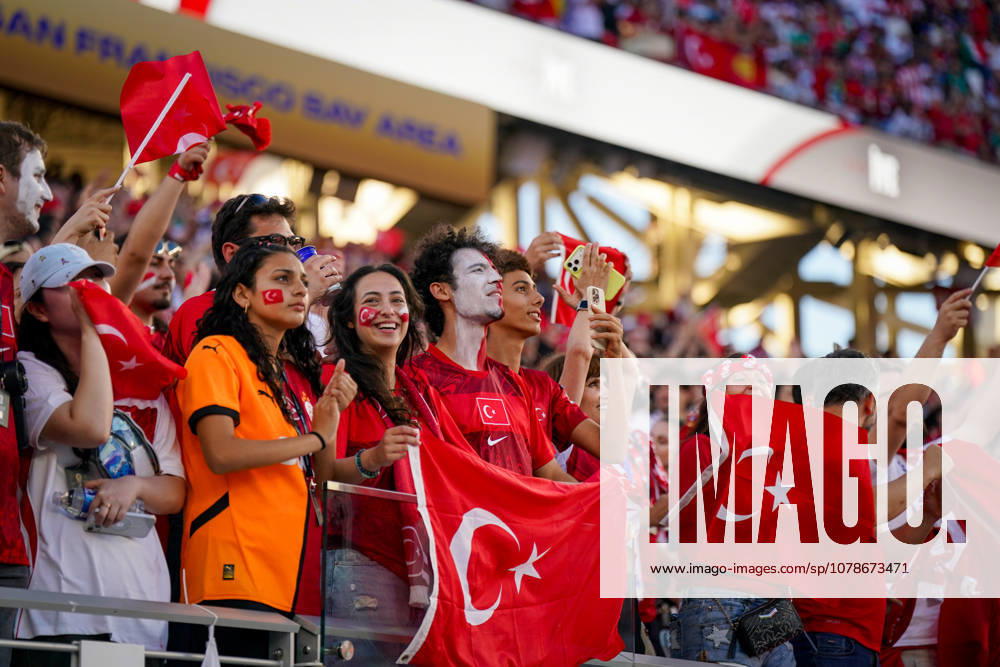 USA Soccer FIFA World Cup 2026 Group Stage Group D Turkey vs. Paraguay Levi’s Stadium Santa Clara, San Francisco Bay Area, Santa Clara County, California Turkey, Turkish fans, fan section, supporters, Turkish flags, national flag, face paint, fan makeup, cheering, emotions, atmosphere, fan culture, spectators, stands, smartphone, selfie, young fans, women, men, stadium, soccer fans, national team, 2026 FIFA World Cup, 2026 FIFA World Cup, Levi’s Stadium, Santa Clara, San Francisco Bay Area, California, USA,detected_source_language