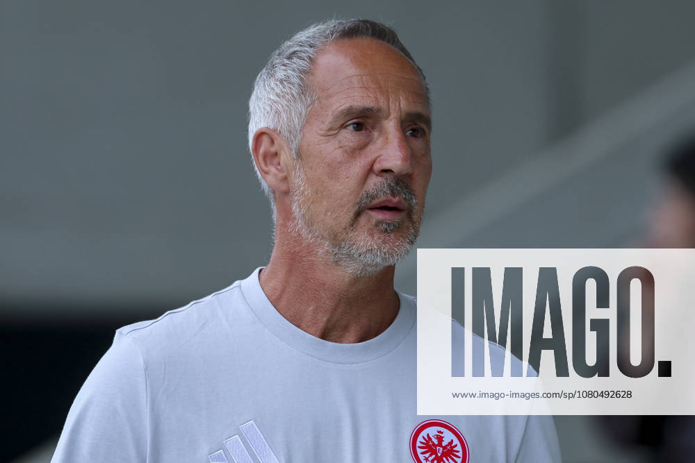 Coach Adi Hütter of Eintracht Frankfurt watches during the friendly match between Trabzonspor and Eintracht Frankfurt, SAK Sportanlage Nonntal on July 26, 2026, in Salzburg, Austria. Photo by Marco Steinbrenner, DeFodi Images. Eintracht Frankfurt coach Adi Hütter looks on during the friendly match between Trabzonspor and Eintracht Frankfurt at SAK Sportanlage Nonntal on July 26, 2026 in Salzburg, Austria. Photo by Marco Steinbrenner, DeFodi Images