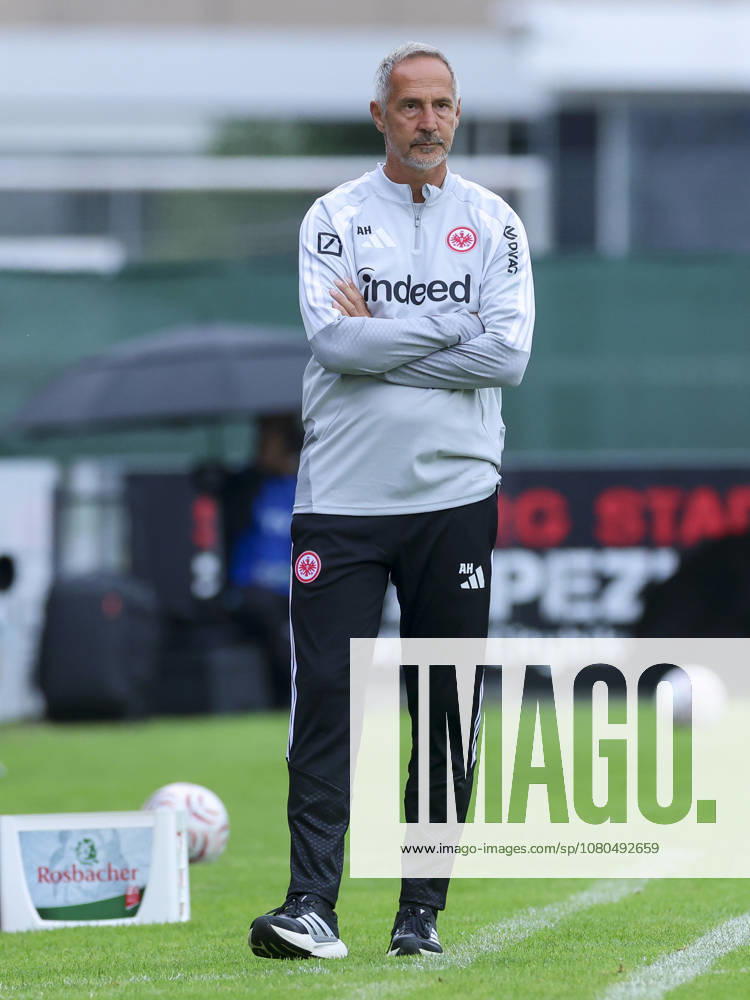 Coach Adi Hütter of Eintracht Frankfurt watches during the friendly match between Trabzonspor and Eintracht Frankfurt, SAK Sportanlage Nonntal on July 26, 2026, in Salzburg, Austria. Photo by Marco Steinbrenner, DeFodi Images. Eintracht Frankfurt coach Adi Hütter looks on during the friendly match between Trabzonspor and Eintracht Frankfurt at SAK Sportanlage Nonntal on July 26, 2026 in Salzburg, Austria. Photo by Marco Steinbrenner, DeFodi Images