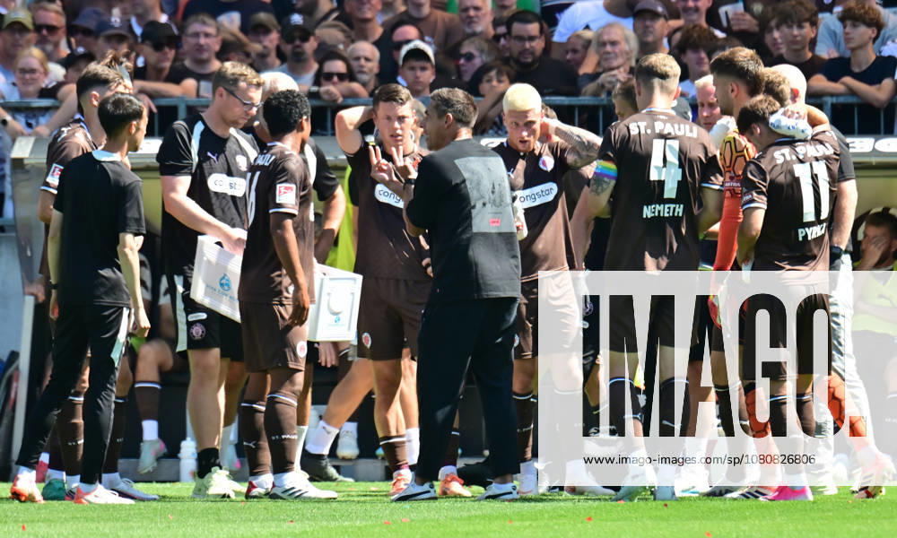 GER Soccer, Men, 2nd Division, Matchday 1, 2026–2027 Season, Hamburg, FC St. Pauli vs. SpVgg Greuther Fürth; Coach Marcel Rapp of St. Pauli speaks with the team; DFB and DFL regulations prohibit any use of photographs as image sequences and or quasi-video; Hamburg Millerntorstadion, Hamburg, Germany