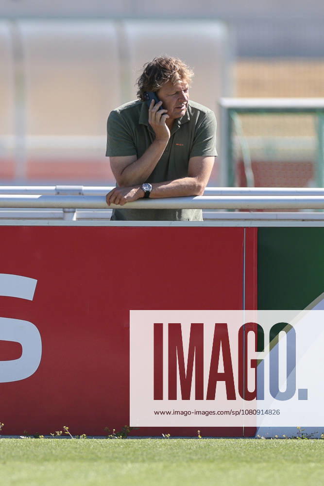 Soccer, FC Schalke 04 Training Session, Director of Professional Soccer Youri Mulder, FC Schalke 04 on the phone, Gelsenkirchen, FC Schalke 04 Training Facility, North Rhine-Westphalia, Germany, xRHR PHOTO YYx
