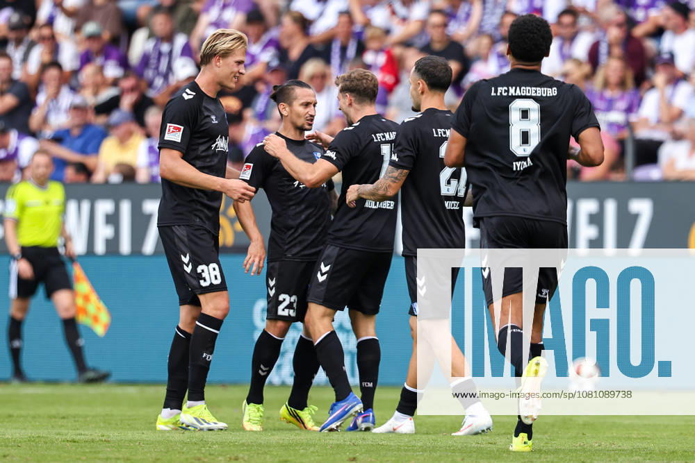 soccer, 2. Bundesliga, VfL Osnabrück vs. 1. FC Magdeburg, Stadion an der Bremer Brücke, Matchday 2, 2026–2027 season. Goal celebration by Luka Hyrylaeinen (1. FC Magdeburg, No. 38), Baris Atik (1 FC Magdeburg, No. 23) and goal scorer Alexander Nollenberger (1 FC Magdeburg, No. 17) at 0–2. DFB regulations prohibit any use of photographs as image sequences and or quasi-video. Photo: WilkowskixPressefotoKochx, Lower Saxony, Germany
