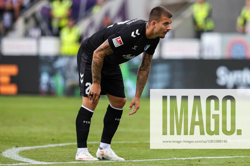 Soccer, 2. Bundesliga, VfL Osnabrück vs. 1. FC Magdeburg, Stadion an der Bremer Brücke, Matchday 2, 2026–2027 Season: Mateusz Zukowski of FC Magdeburg, No. 22, looks determined as he bends over. DFB regulations prohibit any use of photographs as image sequences and or quasi-video. Photo: WilkowskixPressefotoKochx, Lower Saxony, Germany