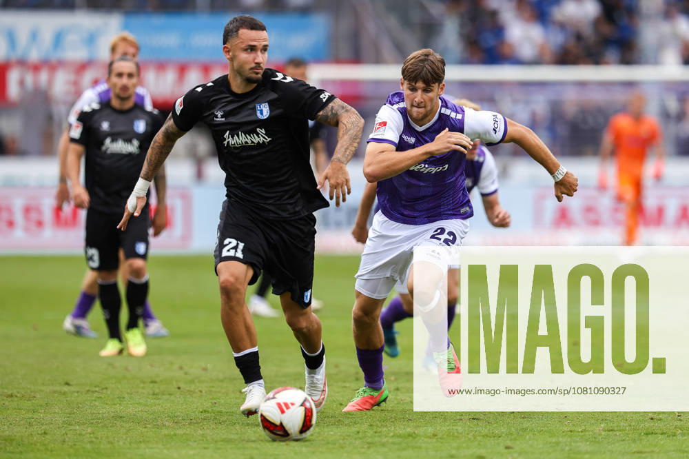 Soccer, 2. Bundesliga, VfL Osnabrück 1 FC Magdeburg, Stadion an der Bremer Brücke, Matchday 2, 2026–2027 Season: Falko Michel (1 FC Magdeburg) 21 in a tackle against Bernd Riesselmann (VfL Osnabrück) 22. DFB regulations prohibit any use of photographs as image sequences and or quasi-video. Photo: WilkowskixPressefotoKochx, Lower, Germany