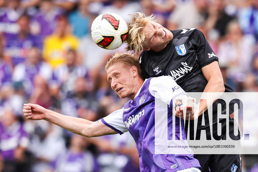 Soccer, 2. Bundesliga, VfL Osnabrück vs. 1. FC Magdeburg, Stadion an der Bremer Brücke, Matchday 2, 2026–2027 Season: Bjarke Jacobsen (VfL Osnabrück, No. 15) heads the ball in a duel against Luka Hyrylaeinen (1. FC Magdeburg, No. 38). DFB regulations prohibit any use of photographs as image sequences and or quasi-video. Photo: WilkowskixPress photo by Koch, Lower Saxony, Germany