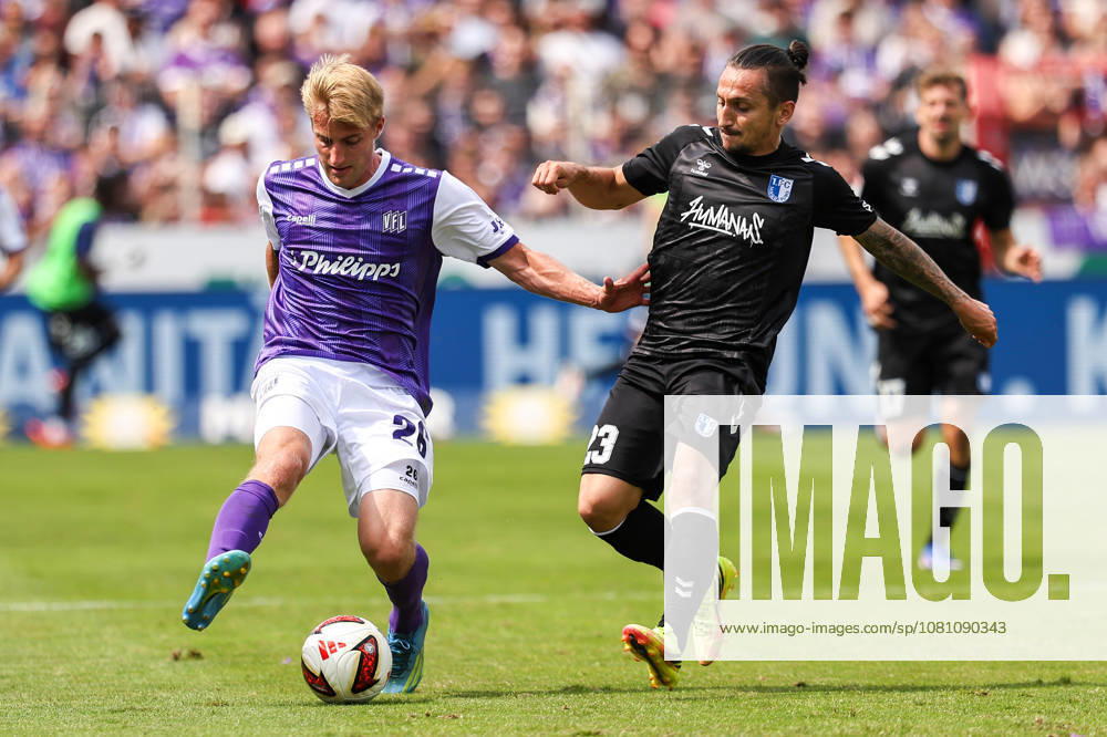 Soccer, 2. Bundesliga, VfL Osnabrück vs. 1. FC Magdeburg, Stadion an der Bremer Brücke, Matchday 2, 2026–2027 Season: Fridolin Wagner (VfL Osnabrück 26) in a tackle against Baris Atik (FC Magdeburg 23). DFB regulations prohibit any use of photographs as image sequences and or quasi-video. Photo: WilkowskixPressefotoKochx, Lowerersachsen, Germany