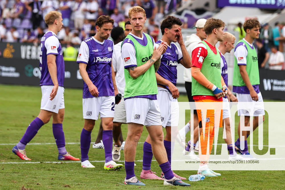 Soccer, 2. Bundesliga, VfL Osnabrück vs. 1. FC Magdeburg, Stadion an der Bremer Brücke, Matchday 2, 2026–2027 Season: Bjarke Jacobsen of VfL Osnabrück 15 claps for fans after a loss, with disappointed players in the background. DFB regulations prohibit any use of photographs as image sequences and or quasi-video. Photo: WilkowskixPressefotoKochx LowerLower Saxony, Germany