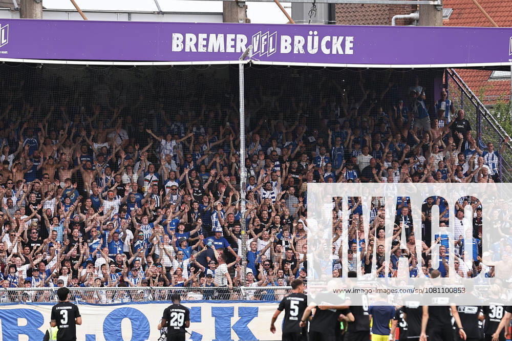 Soccer, 2. Bundesliga, VfL Osnabrück 1 FC Magdeburg, Stadion an der Bremer Brücke, Matchday 2, 2026–2027 season. The Magdeburg away fans celebrate the victory. DFB regulations prohibit any use of photographs as image sequences and or quasi-video. Photo: WilkowskixPressefotoKochx, Lower Saxony, Germany