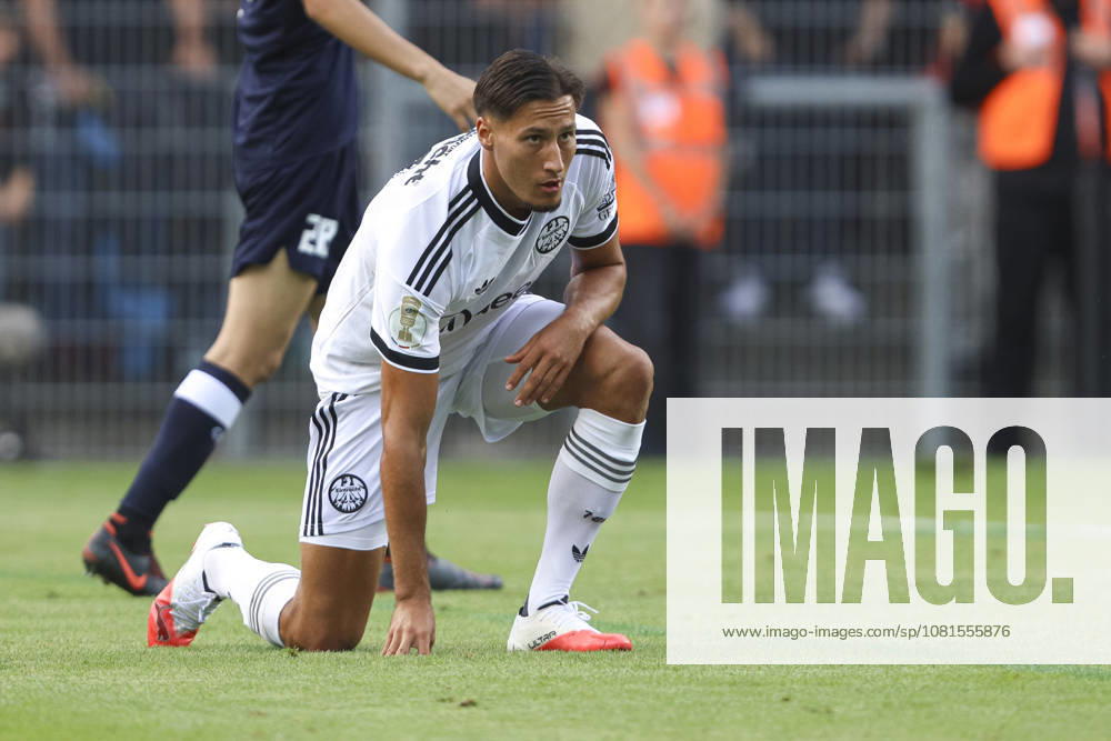 Younes Ebnoutalib of Eintracht Frankfurt looks at the ground during the first-round match of the DFB Cup between SC St. Toenis and Eintracht Frankfurt at Grotenburg Stadium on August 21, 2026, in Krefeld, Germany. Photo by Oliver Kaelke, DeFodi Images. Younes Ebnoutalib of Eintracht Frankfurt looks on, lying on the ground during the first-round match of the DFB Cup between SC St. Toenis and Eintracht Frankfurt at Grotenburg Stadium on August 21, 2026 in Krefeld, Germany. Photo by Oliver Kaelke, DeFodi Images. DFB and DFL regulations prohibit any use of photographs as image sequences and or quasi-video. Photo by Oliver Kaelke, DeFodi Images.
