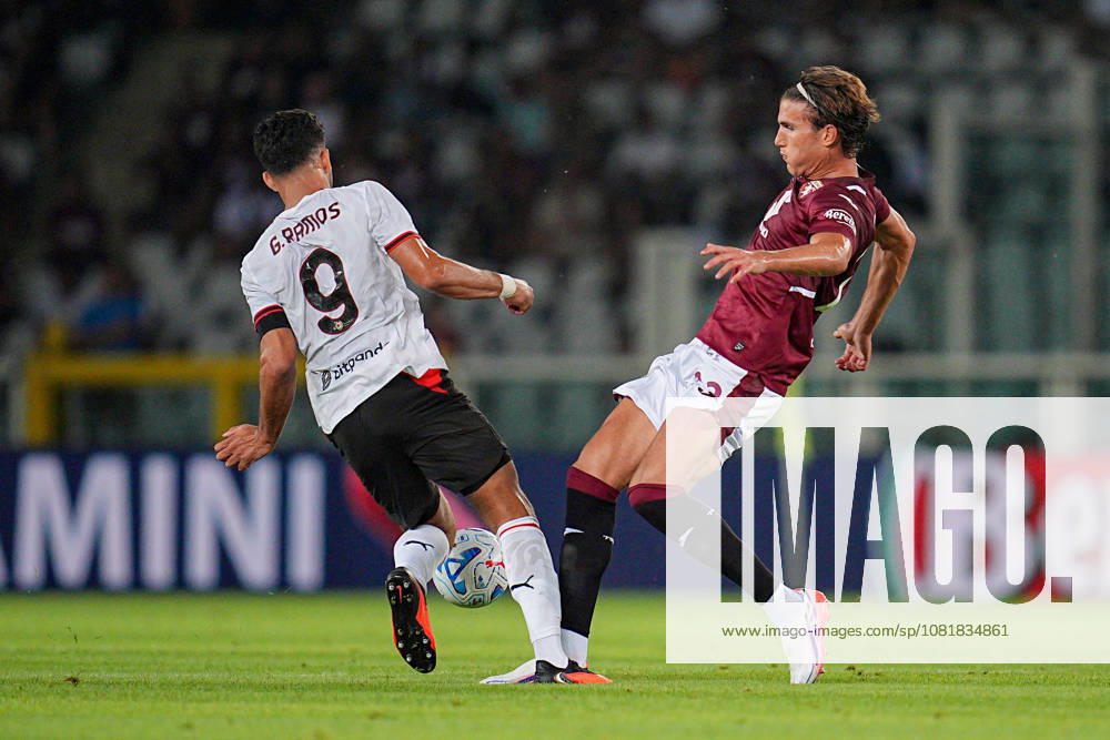 Milan s Goncalo Ramos fights for the ball with Torino FC s Cesare Casadei during the Serie A soccer match between Torino and Milan at the Stadio Olimpico Grande Torino in Turin, north west Italy - Sunday, August 23, 2026. - Soccer .