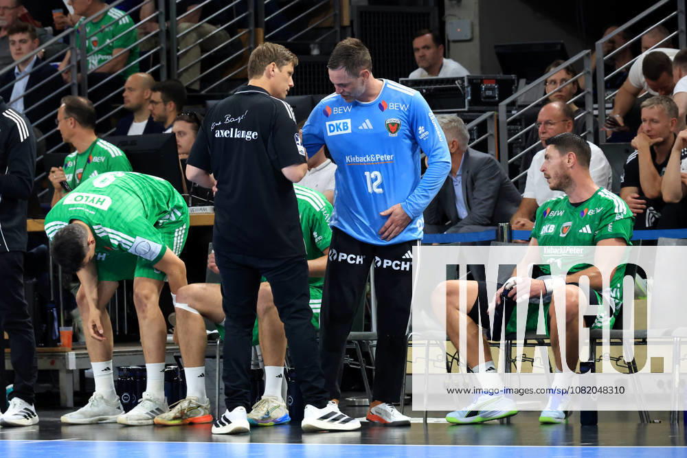 GER Germany, Handball, 1st Bundesliga, August 27, 2026, 2026–2027 season, Berlin, Fuechse Berlin vs. Melsungen; Head Coach Nicolej Krickau, Fuechse Berlin; Palicka, Andreas, Fuechse Berlin 12; talking, discussing; Berlin Max Schmeling Halle, Berlin, Germany